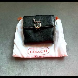 Gently used black authentic Coach wallet.